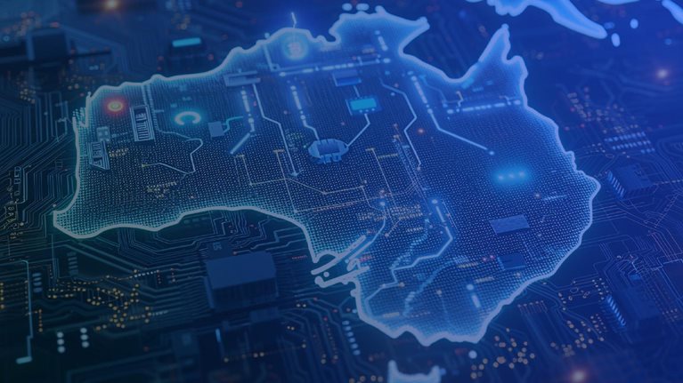 Outline of Australia superimposed over computer chip. - stock image