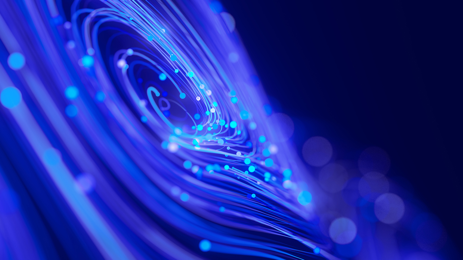 Abstract blue and purple fiber-optic strands curve around glowing cyan points of light.