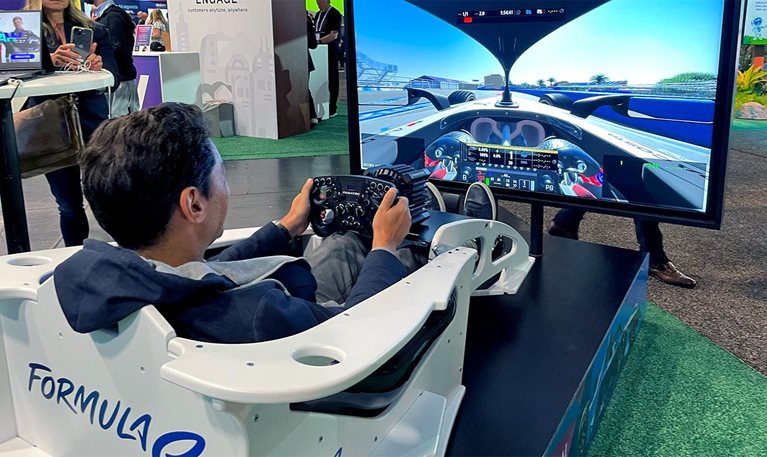 Dreamforce attendees try out McKinsey's AI-powered Formula E electric race car simulator