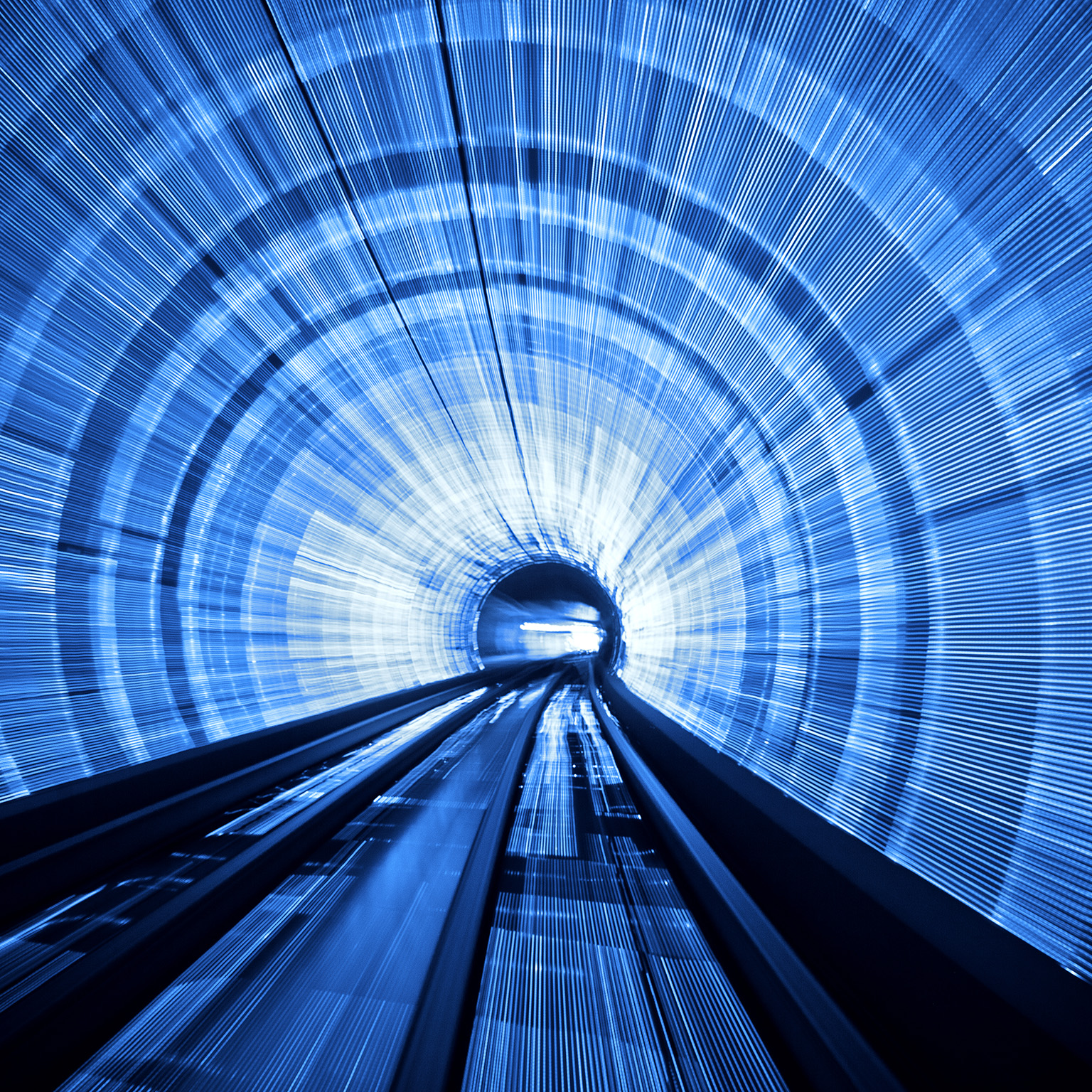 Abstract background light waves in deep tunnel as seen from a train in Shanghai, China