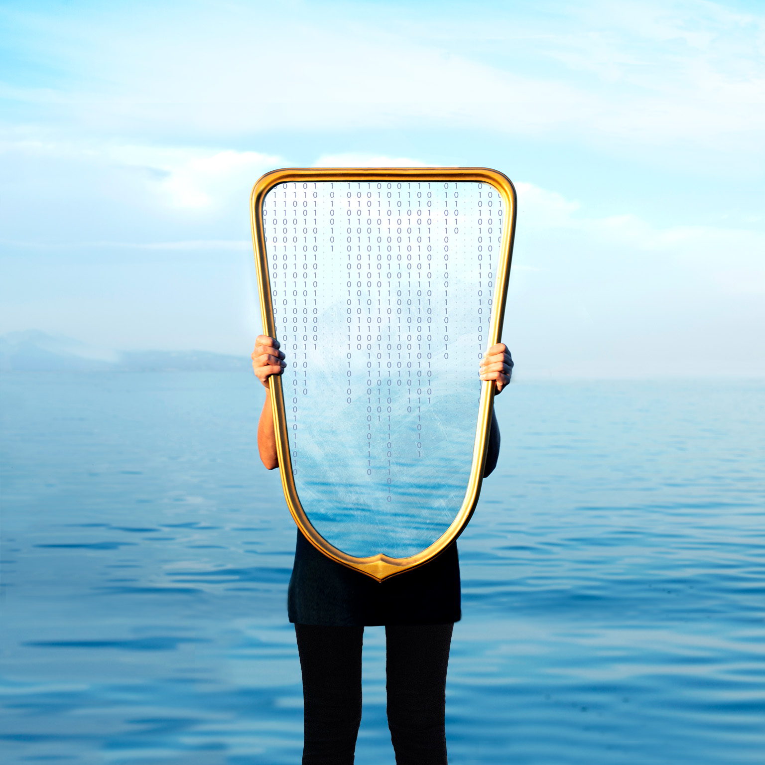 A woman stands at the ocean’s horizon, holding a mirror in front of her. It reflects the sky and a cascade of zeros and ones.