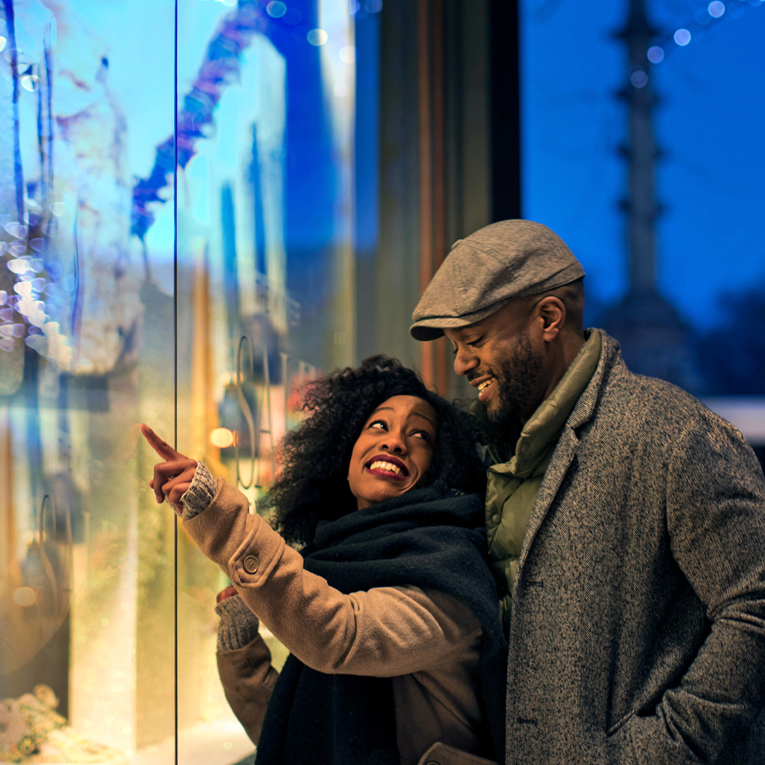 Happy couple window shopping