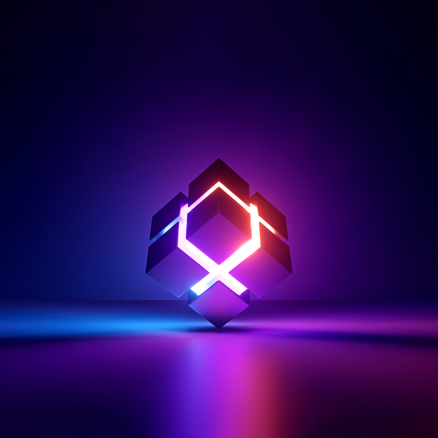 Against a dark blue backdrop, a cube radiates a vibrant blend of purple and orange light from its center. Divided in half crosswise, the center casts an ethereal glow onto the surrounding surface.