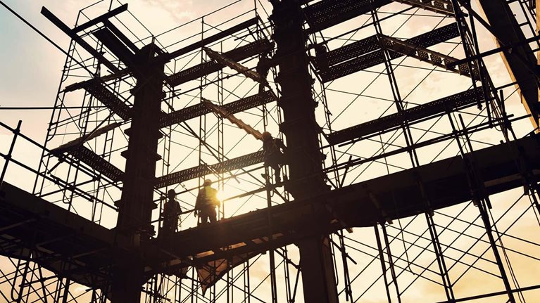 Construction site on sunset background