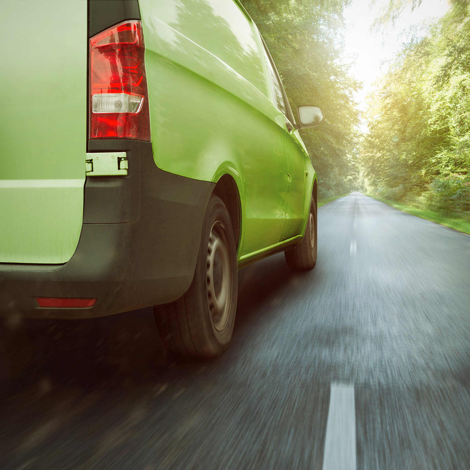 Sustainable freight transport vehicle driving down road