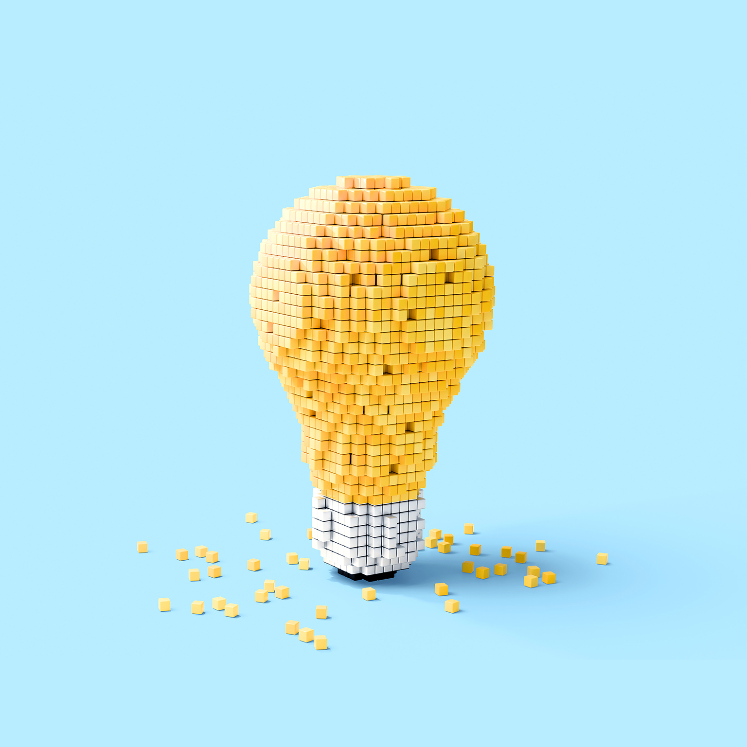 Light bulb shape made of small yellow cubes on a blue background.