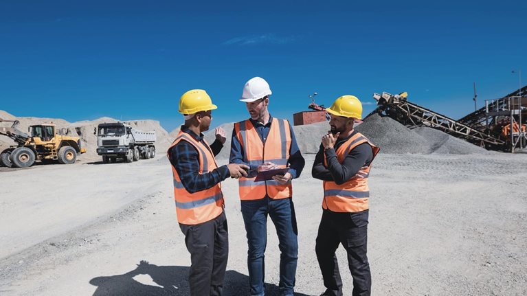 Workers in an industrial field