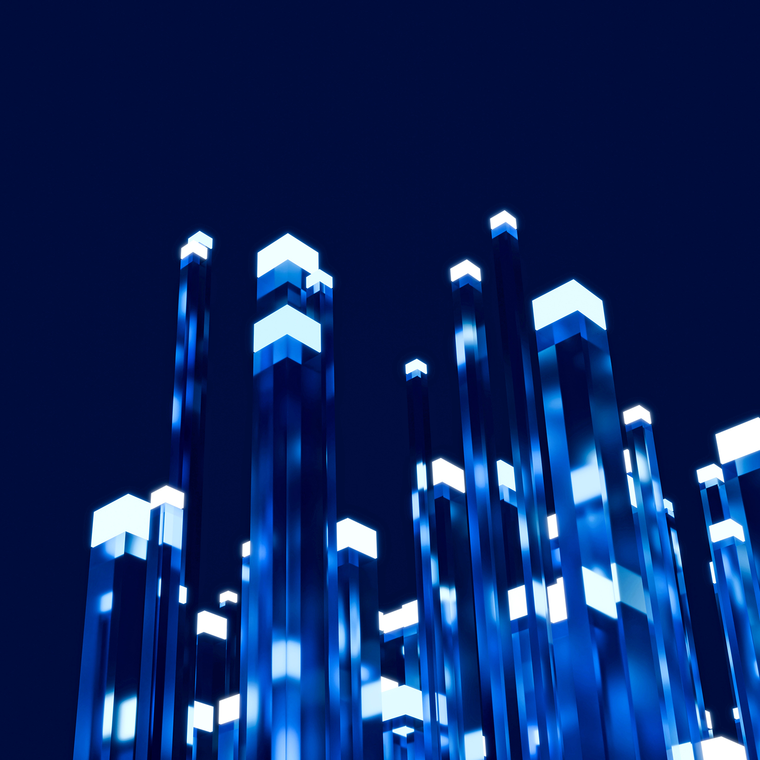 Abstract blue illuminated pillars rising against a dark background