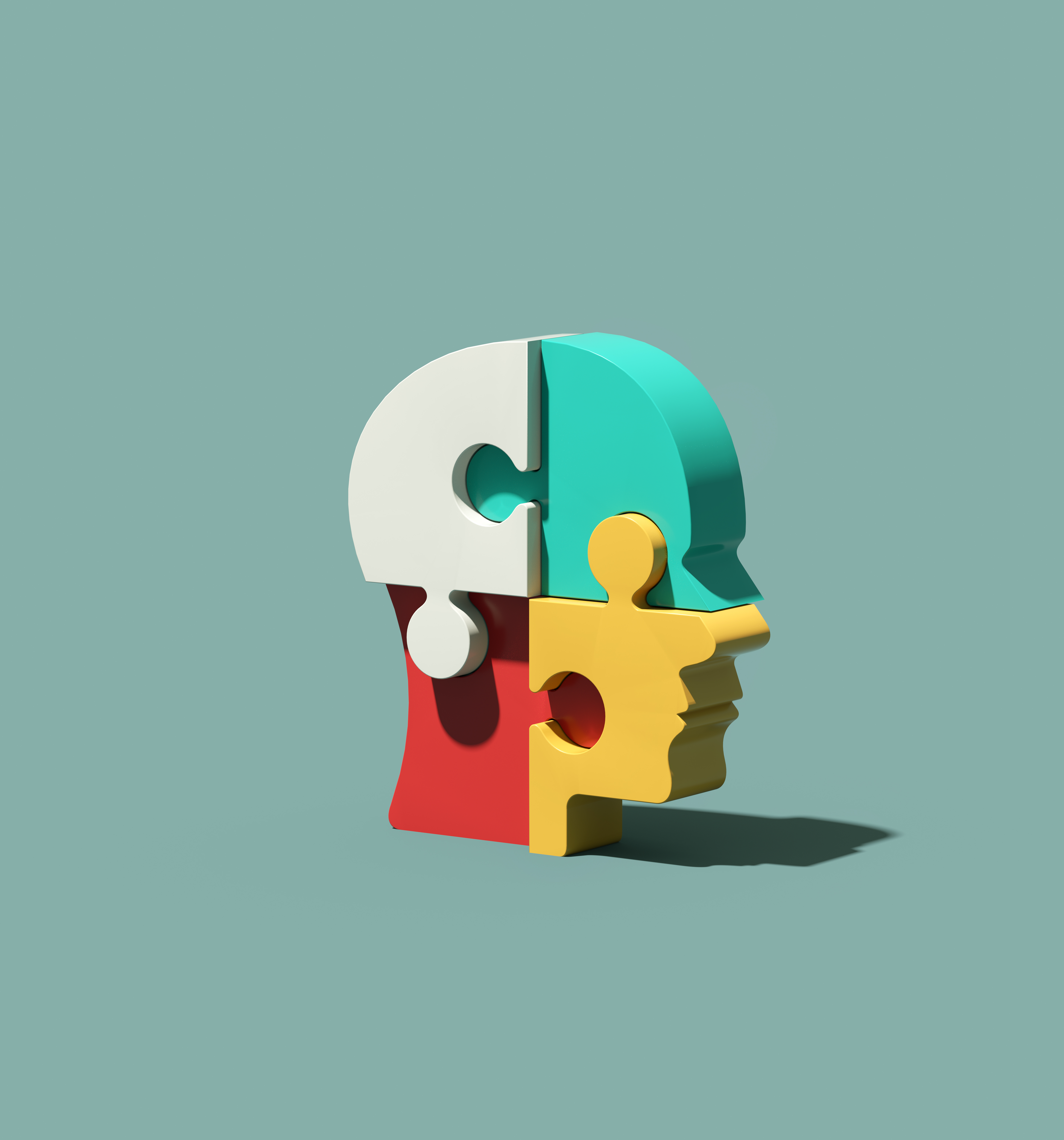 Head made from jigsaw puzzles - stock photo