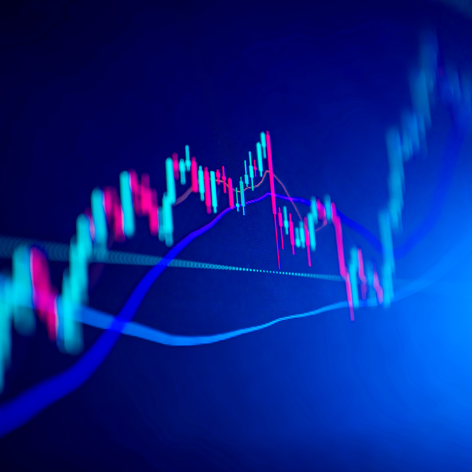 Market volatility represented by a graph with a red and green candlestick chart pattern for up and downtrends. 