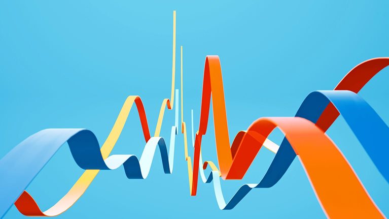 Colorful ribbons flow forward over a cyan background from a dynamic, low-angle perspective.