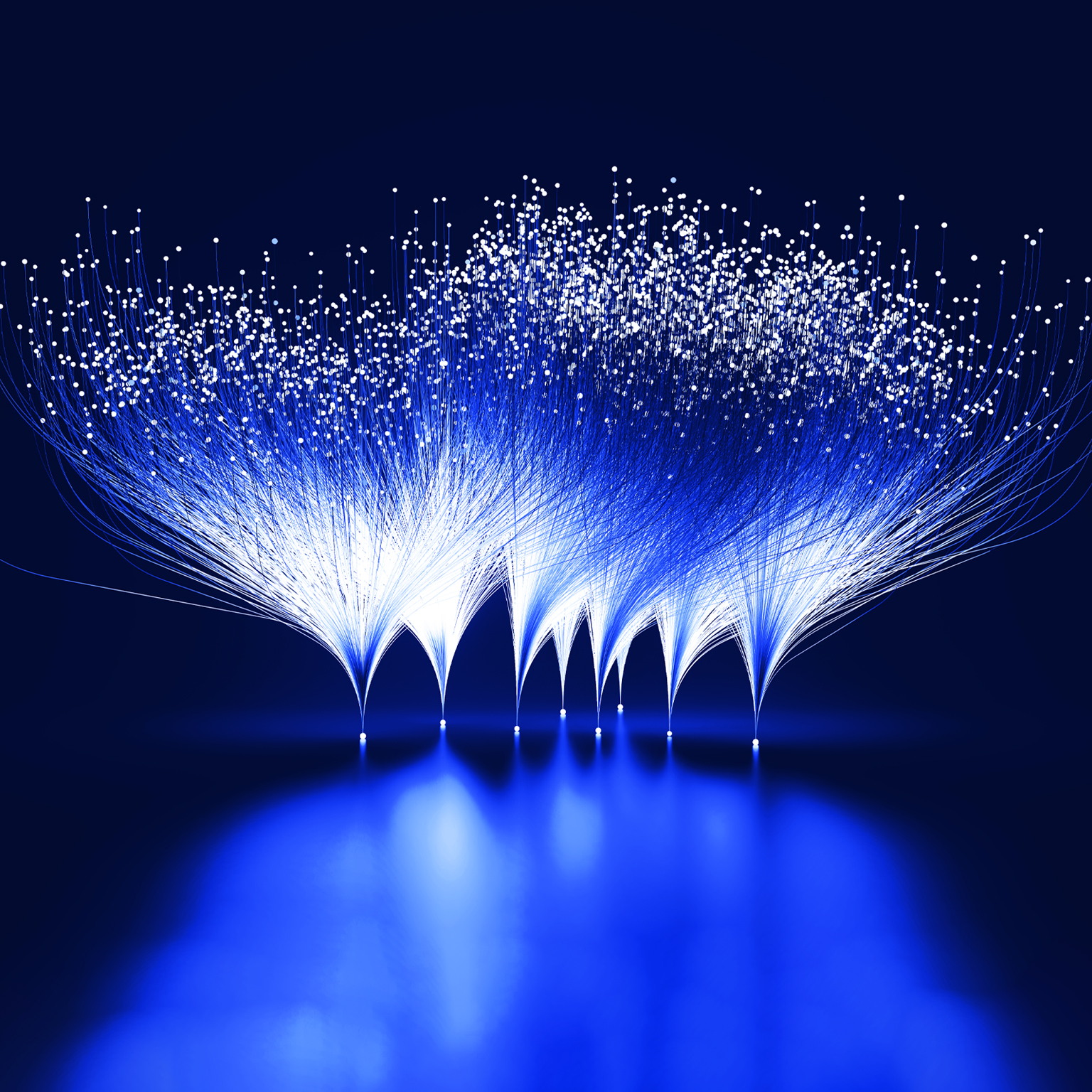 Abstract blue and white lines emanating from white dots against a dark blue background. This visual metaphor represents the branching-out and expansive growth facilitated by innovation.