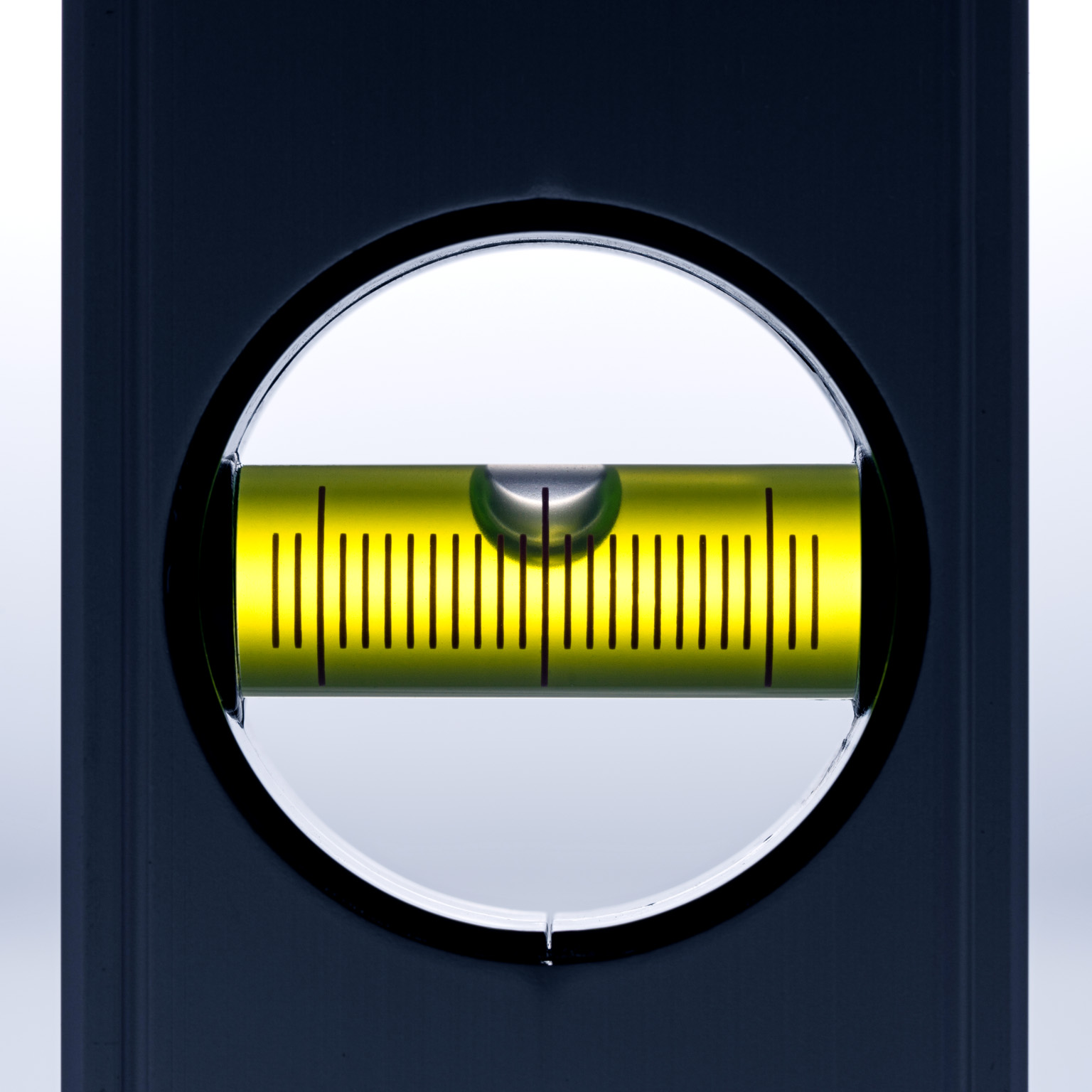 Back-lit spirit level close-up view against white background