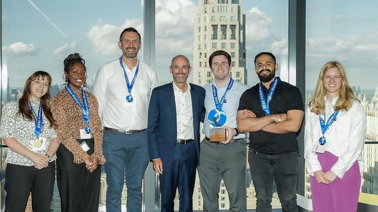 Innovation Olympics winning team, with Iris Roelens, John Law-Lund, and Suryansh Soni