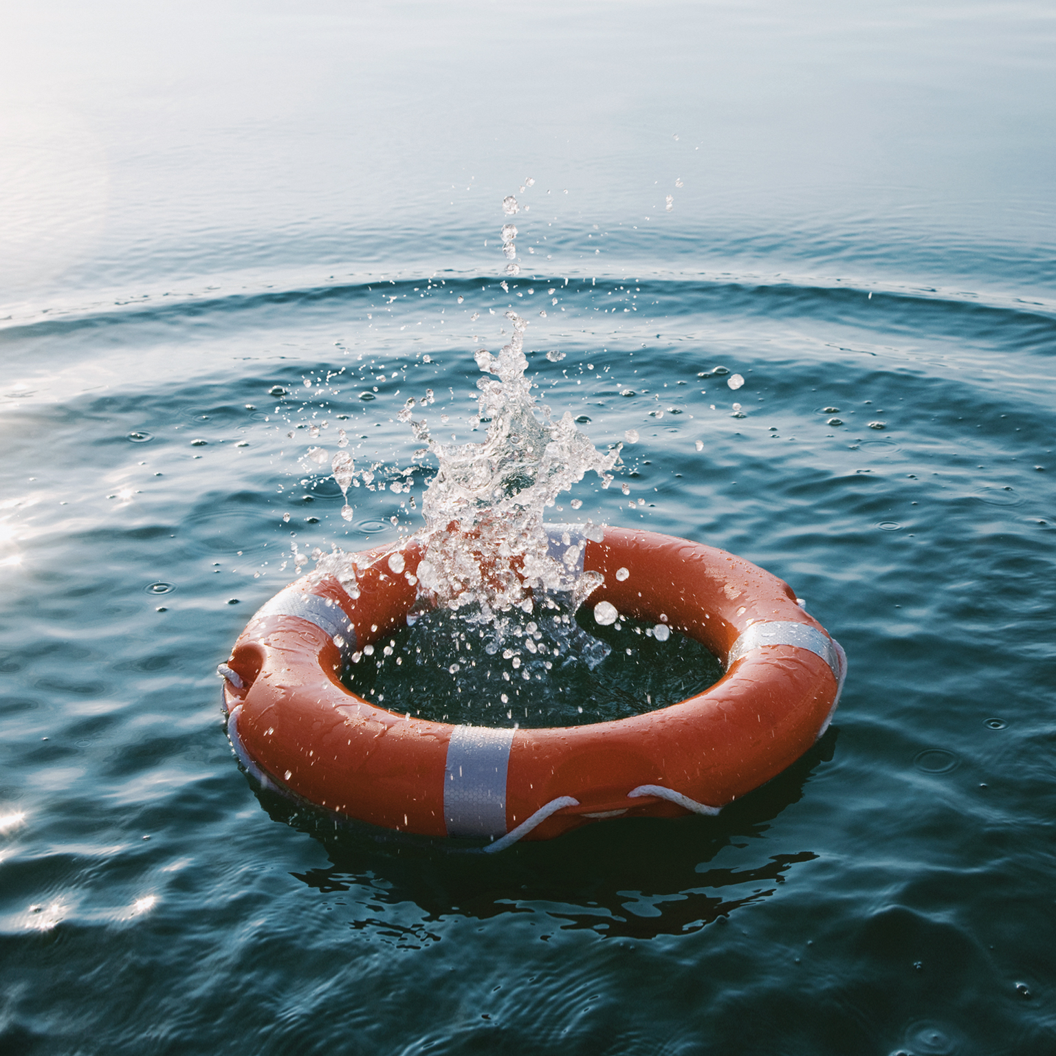 Life raft splashing in water