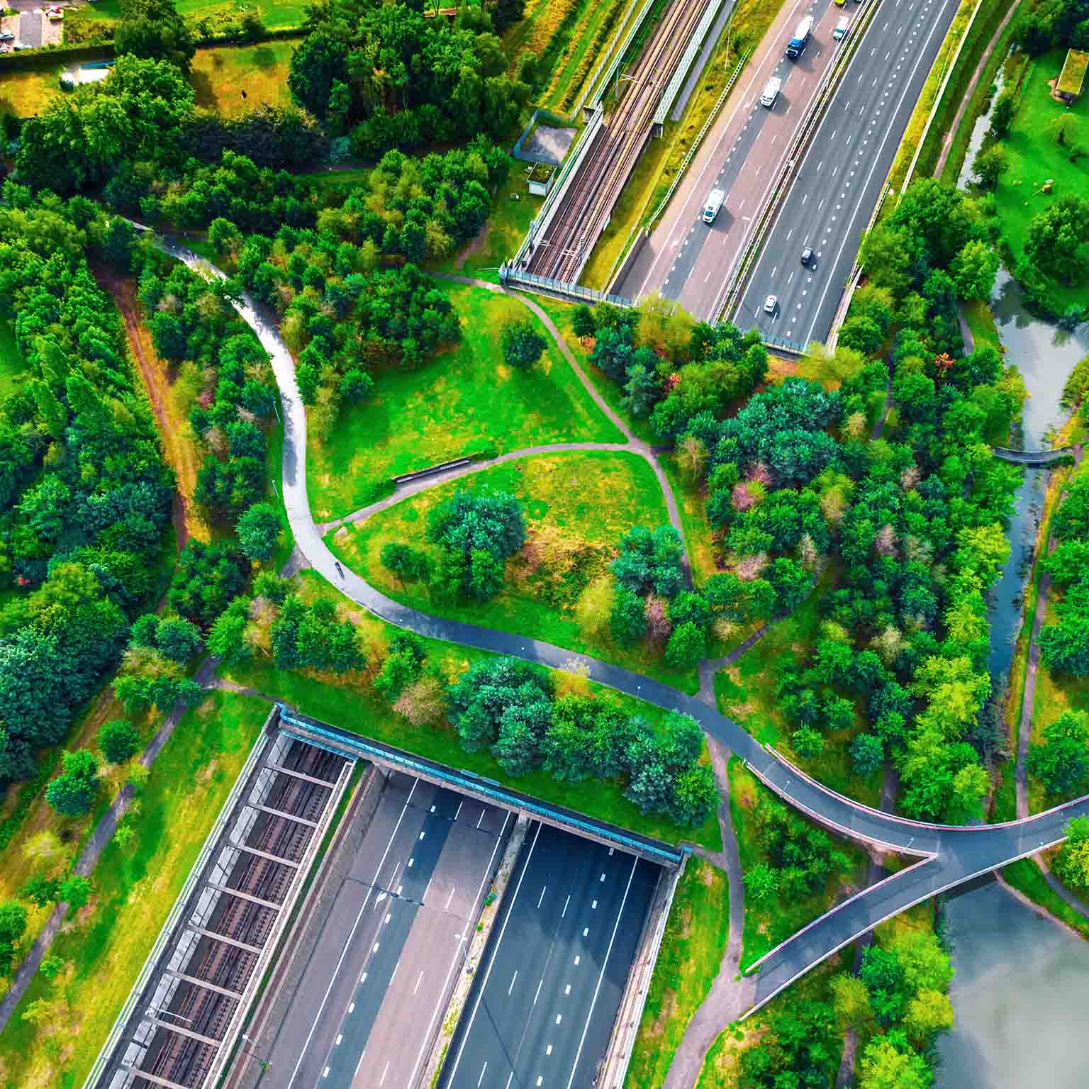 Photo of overview shot of a park with a highway