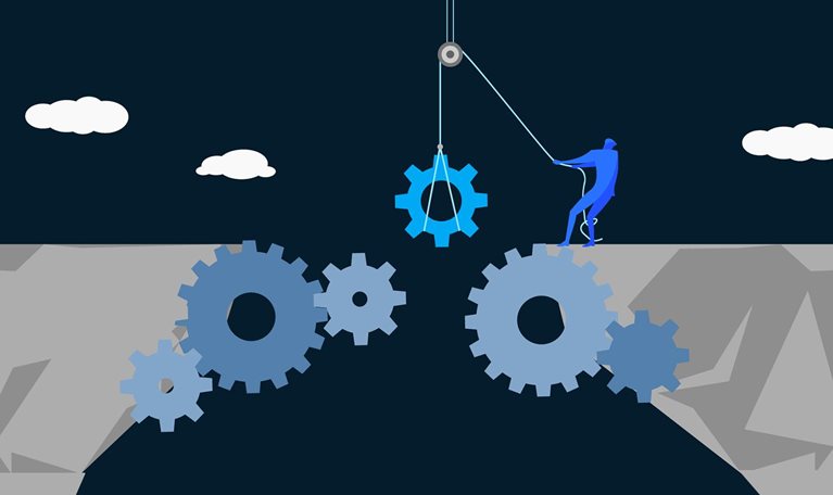 A flat-style digital illustration shows a blue human figure standing at the edge of a cliff, using a rope and pulley to lower a cyan gear into the gap between two rocky gray cliffs. Interlocking blue and gray gears of various sizes bridge the chasm below, set against a dark navy sky with white clouds.
