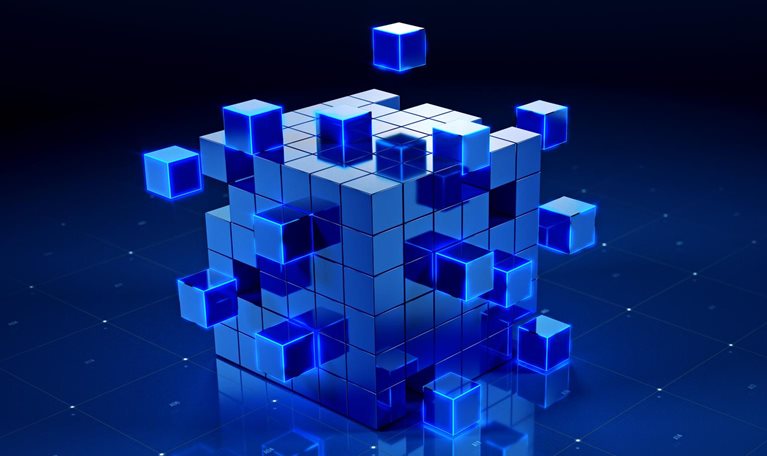 Abstract 3D image of a large cube assembled from smaller blue cubes, with several glowing cubes floating around it above a dark blue grid surface.