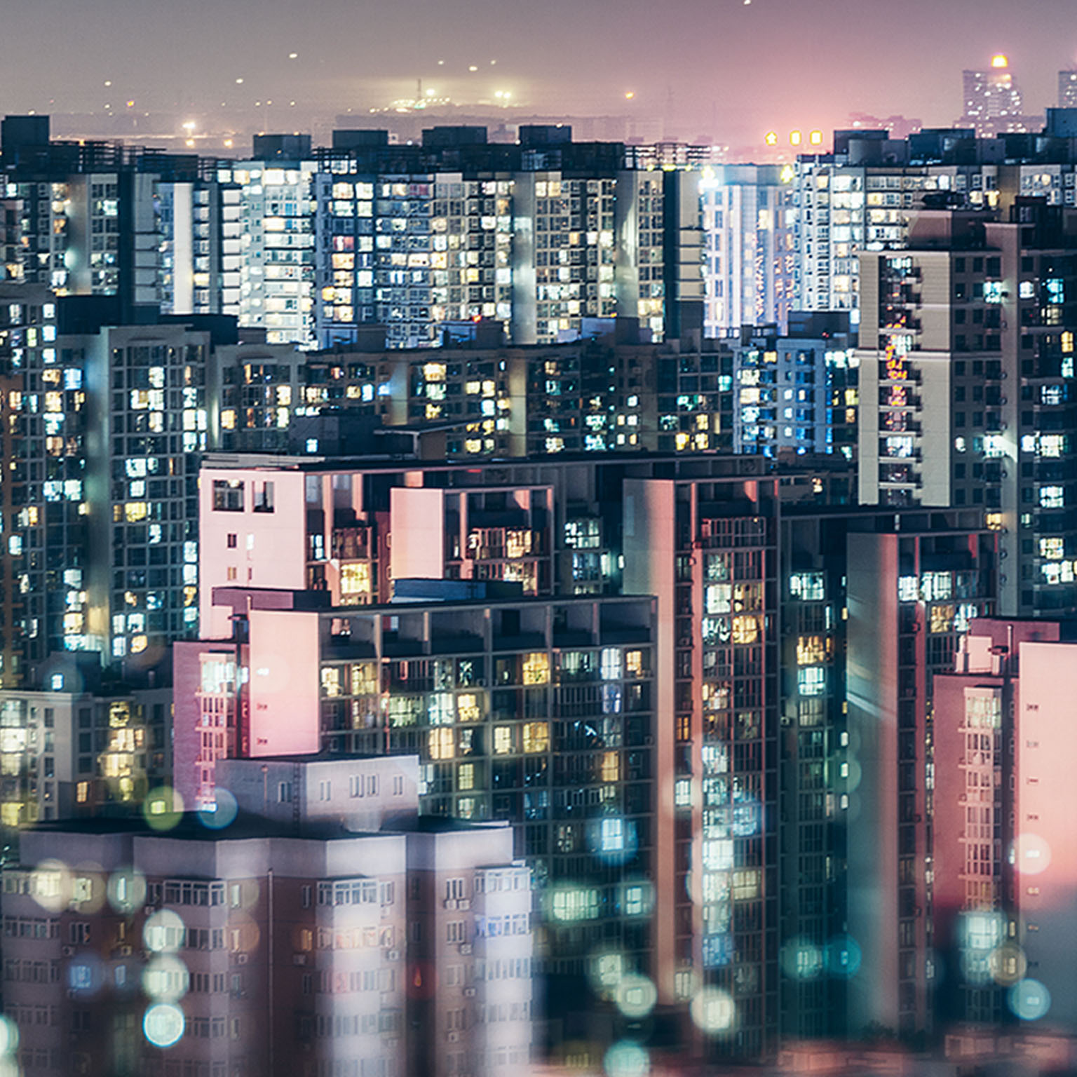 Residential neighborhood apartment building in Beijing at night.