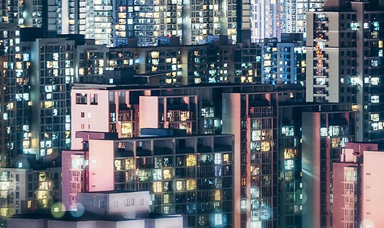 Residential neighborhood apartment building in Beijing at night.
