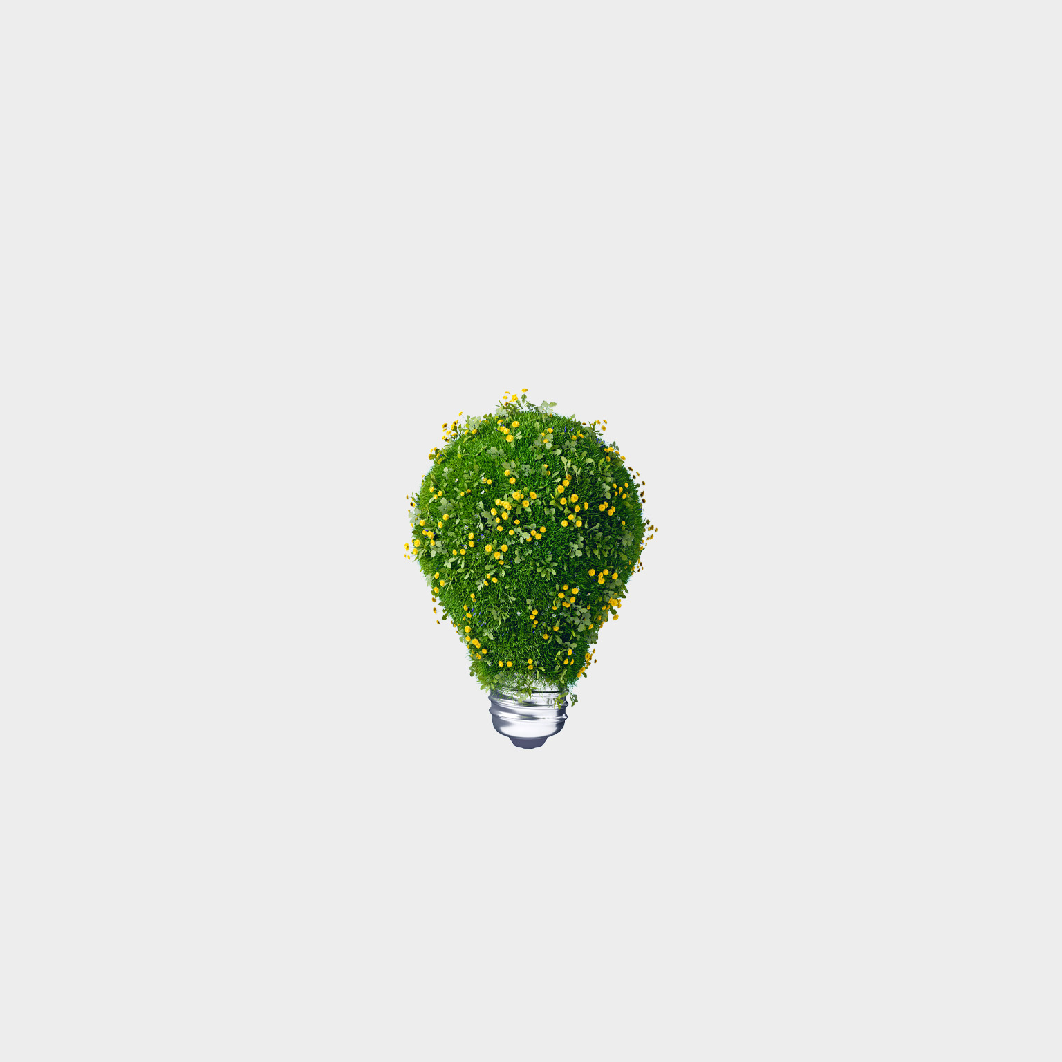 A 3D rendering of light bulb covered with green grass and blooming yellow flowers against light gray background