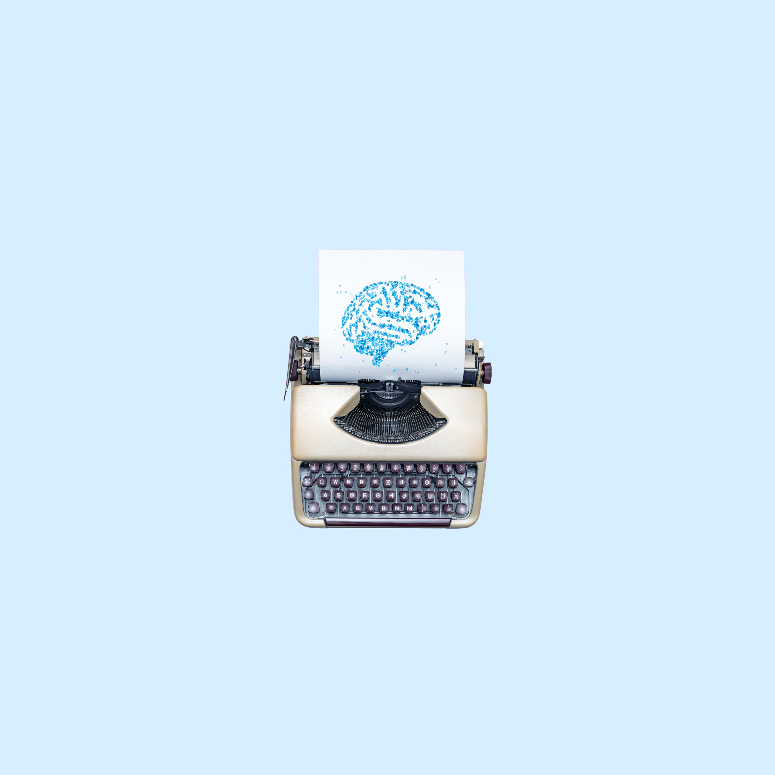 An old fashioned type writer with a sheet of paper advancing from it. The paper has the pattern of a brain made of recently typed letters imprinted upon it. 