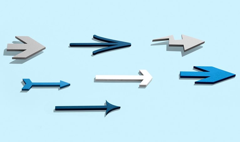 A group of different arrows moving forwards together