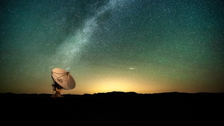 The Milky Way over a radio telescope at the Karl G. Jansky Very Large Array National Radio Astronomy Observatory in New Mexico