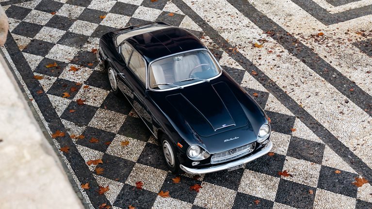 Overhead view of Flaminia SS on diamond patterned driveway.