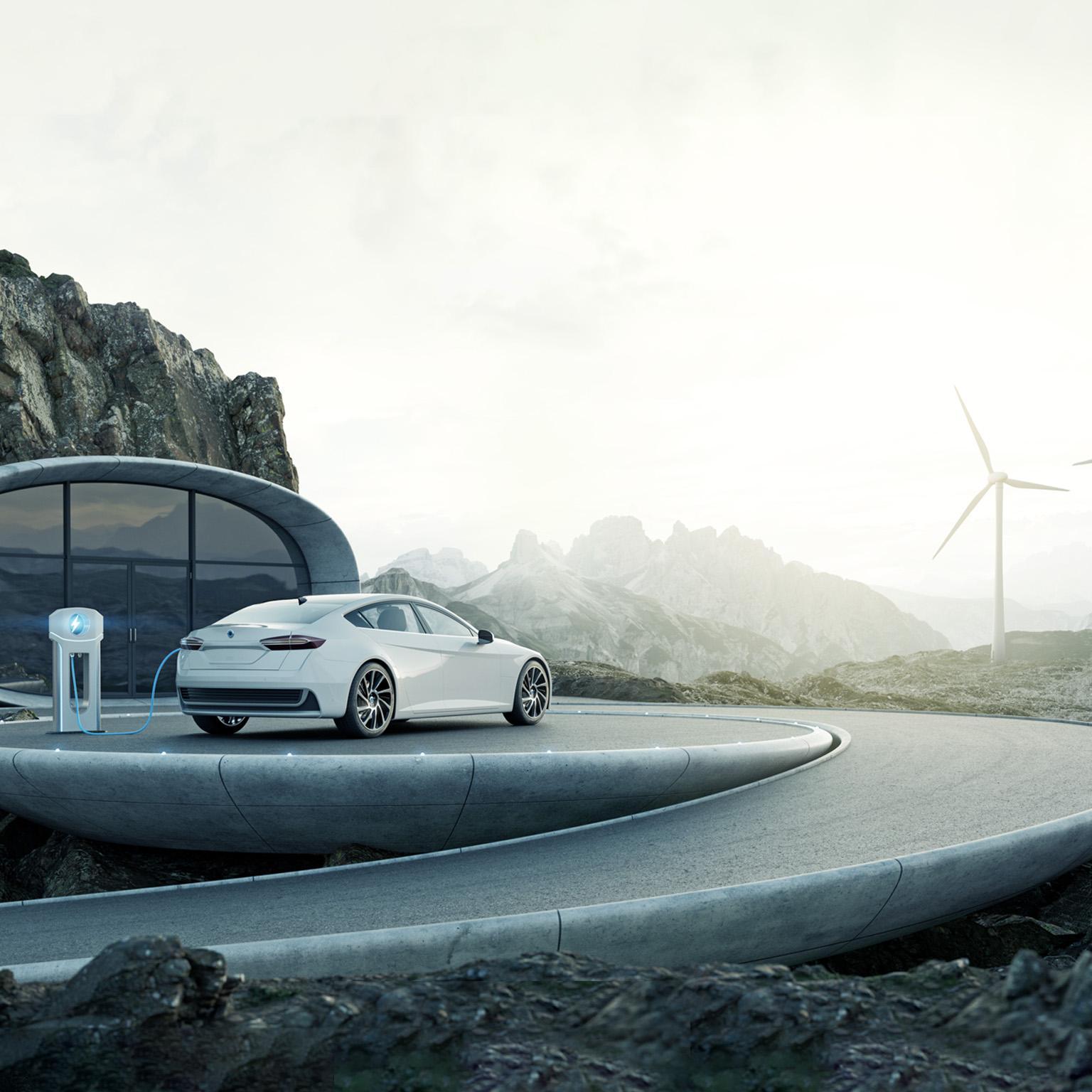 Electric car charging at modern architecture with wind turbines