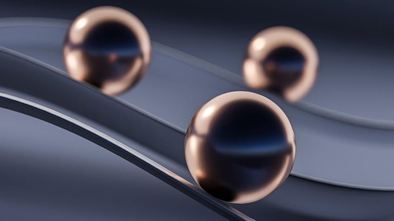 Balls on curvy paths - stock photo