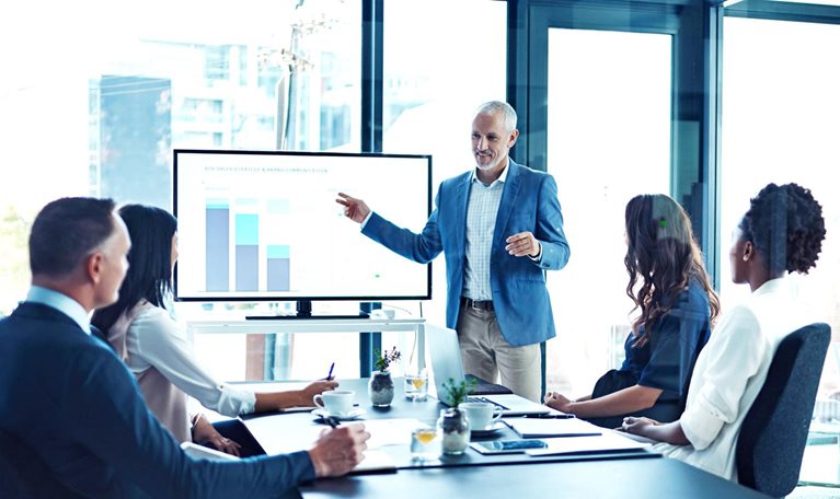 Businessman giving a presentation in a boardroom