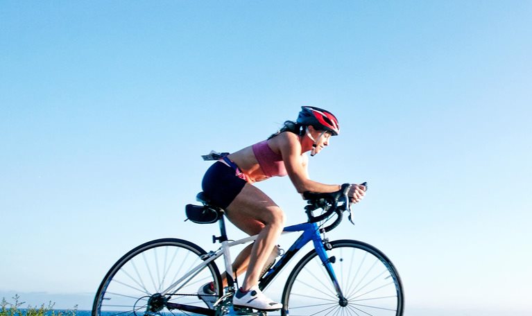 Woman competing in triathlon