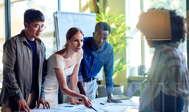 Focused team working collaboratively during a business strategy planning session