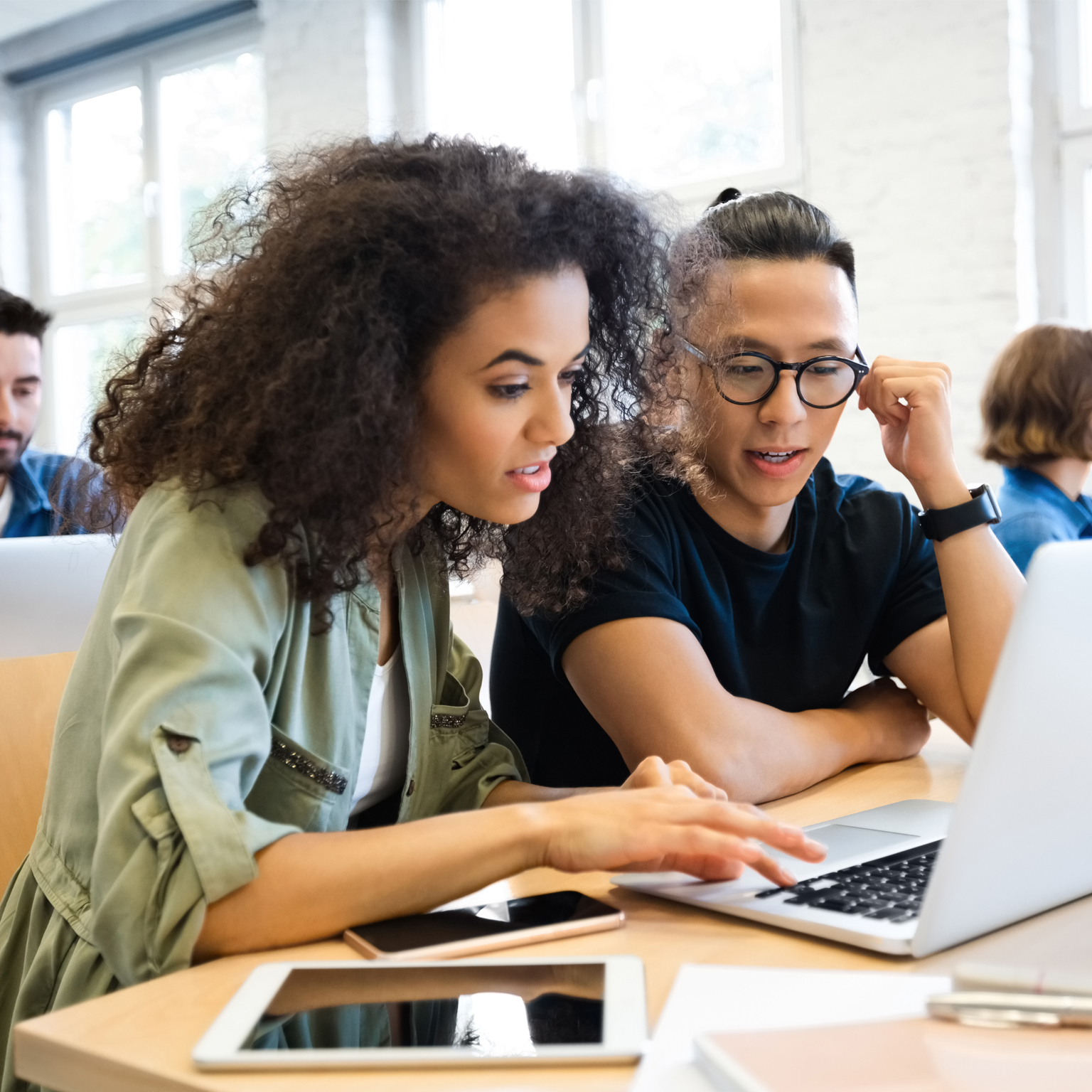 photo students working on laptop
