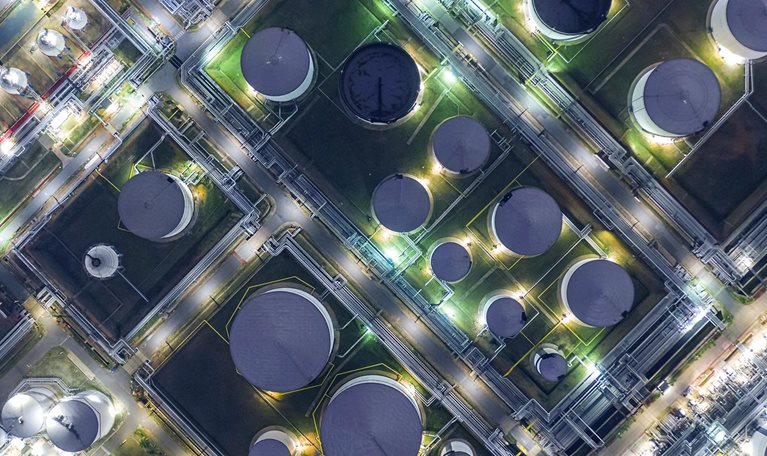 Aerial view oil terminal is industrial facility for storage of oil and petrochemical products ready for transport to further storage facilities