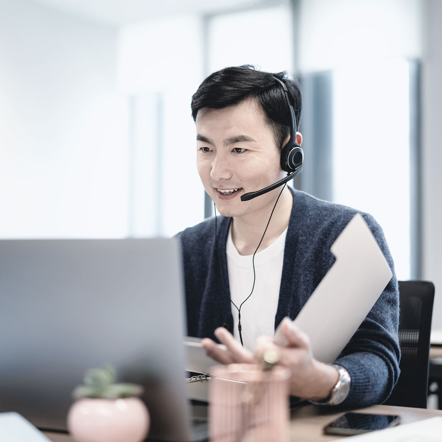 Business people negotiate business through video