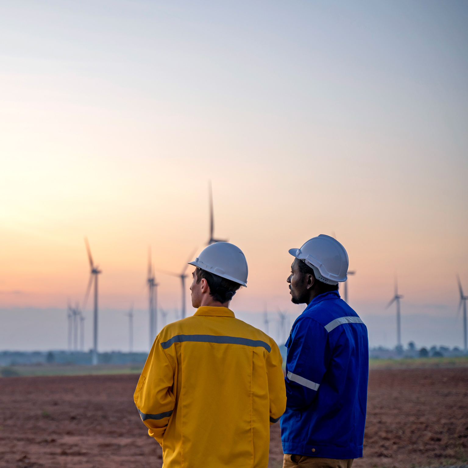 Windmills and Workers - stock photo