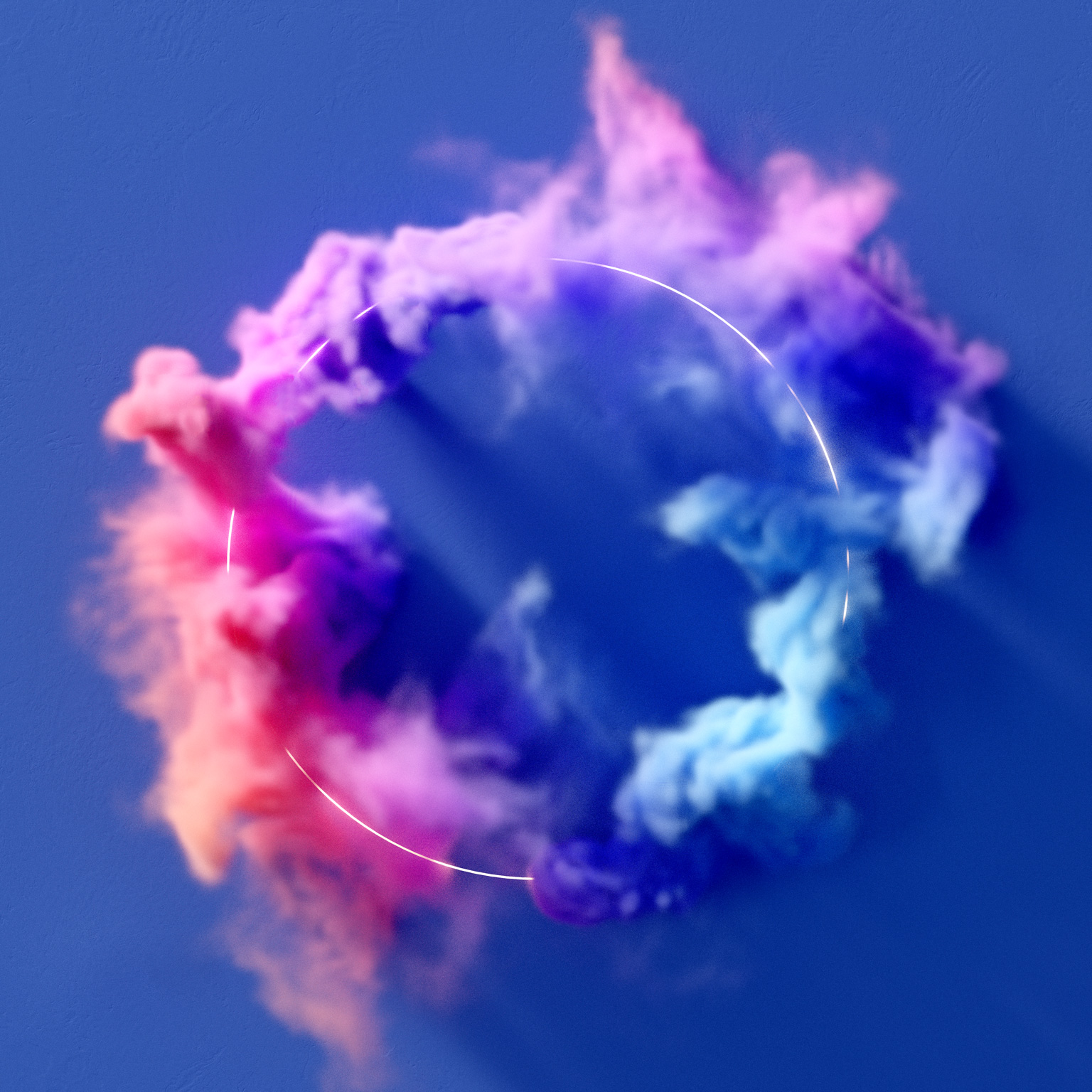 Colorful smoke flowing around a glowing ring