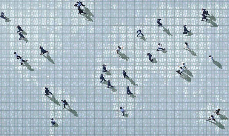 Businessmen walking on binary code world map