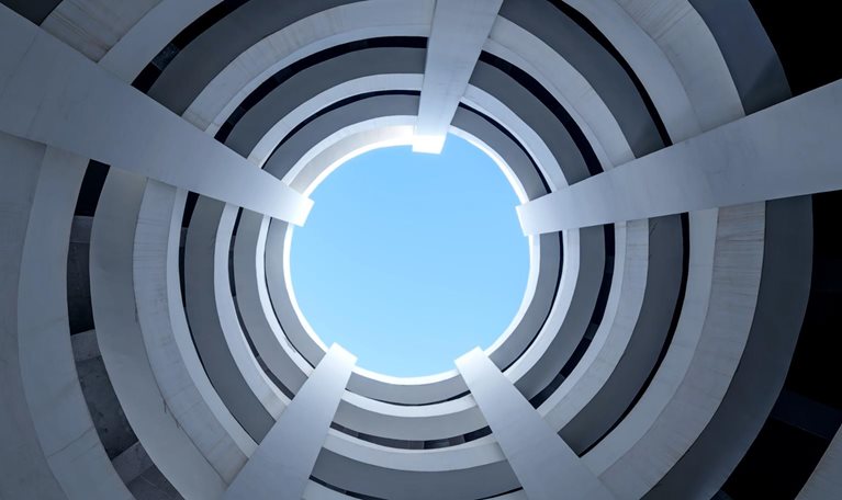 Low angle view looking up of concrete spiral parking garage