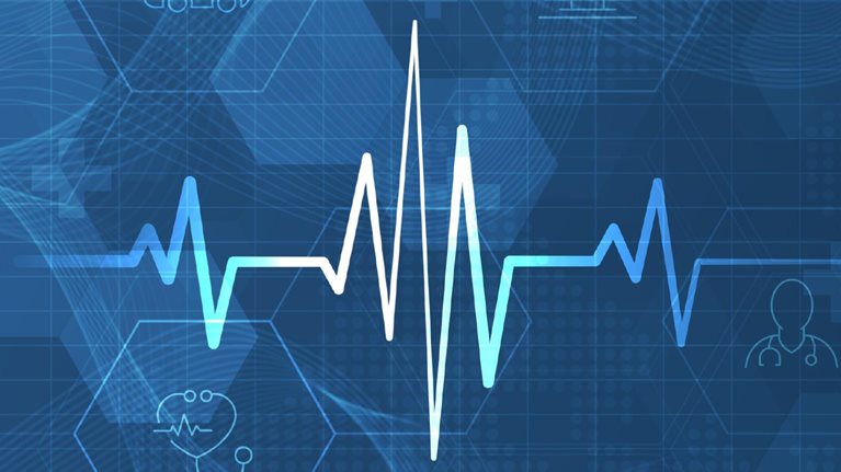Heart pulse and heartbeat against digital healthcare background.