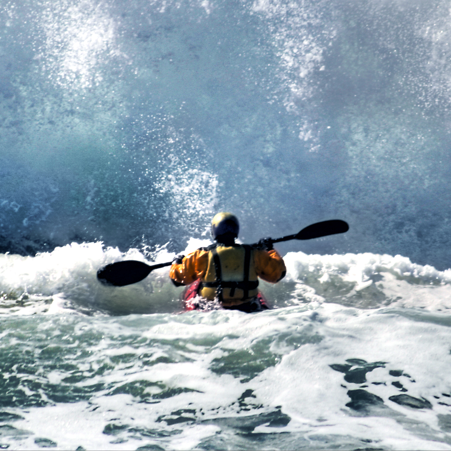 A person whitewater rafting