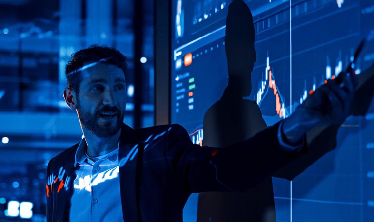 Business conference meeting presentation: Businessman does analysis talks to group of business people.