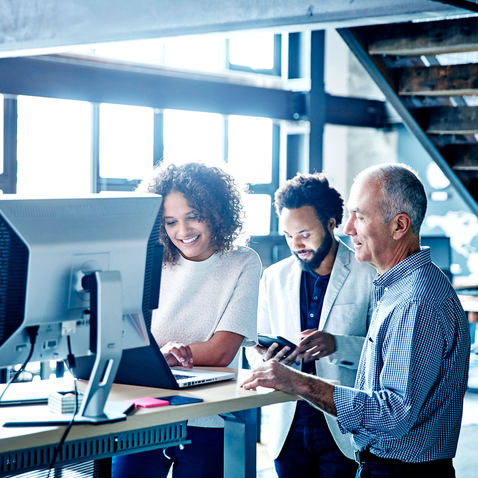 People working with technology