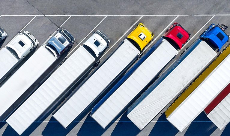 Large Group of Trucks at Truck Stop, Aerial View