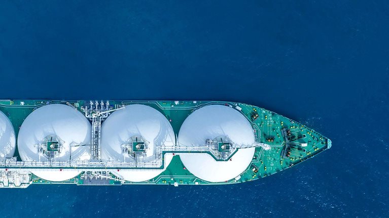 LNG (Liquified Natural Gas) tanker sailing a vast ocean scene