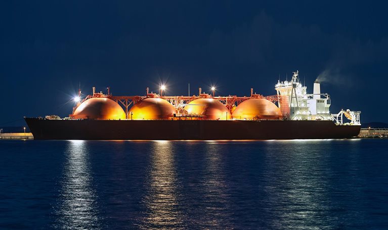 Picture of LNG tanker in port at night. - stock photo
