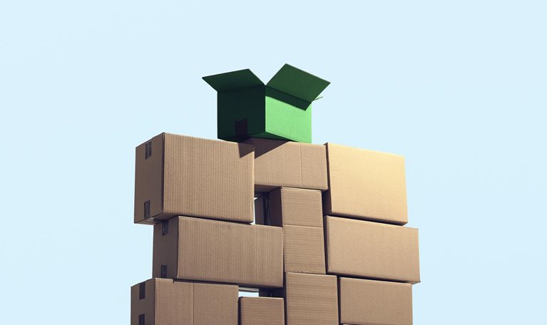 A large pile of cardboard boxes stacked on top of each other