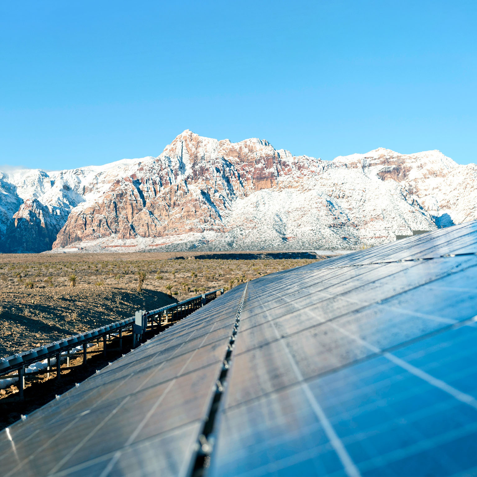 Mountains behind Solar panels